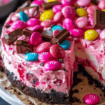 Pink M&M Snickers Cheesecake