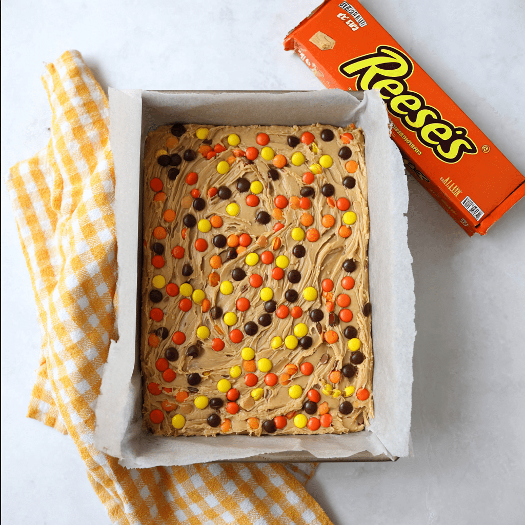Chewy REESE'S PIECES Peanut Butter Brownies Recipe - Recipe Image