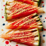 Grilled Melon With Tahini, Chili Oil and Sesame Seeds Recipe