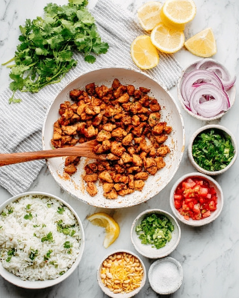 The image shows a white frying pan filled with small browned chicken pieces being stirred with a wooden spoon held by a woman's hand. To the top left, there are fresh green cilantro leaves and two lemon slices on a white and gray striped cloth. Below the pan, a white bowl contains white rice mixed with green herbs and a lemon wedge on the side. In front of the rice bowl, there are four small white bowls arranged in a line, each containing different ingredients: finely chopped red tomatoes, crushed yellow nuts, fresh chopped green herbs, and white salt. The whole setup is placed on a white marbled surface with some thinly sliced red onions near the bowls. Photo taken with an iphone --ar 4:5 --v 7