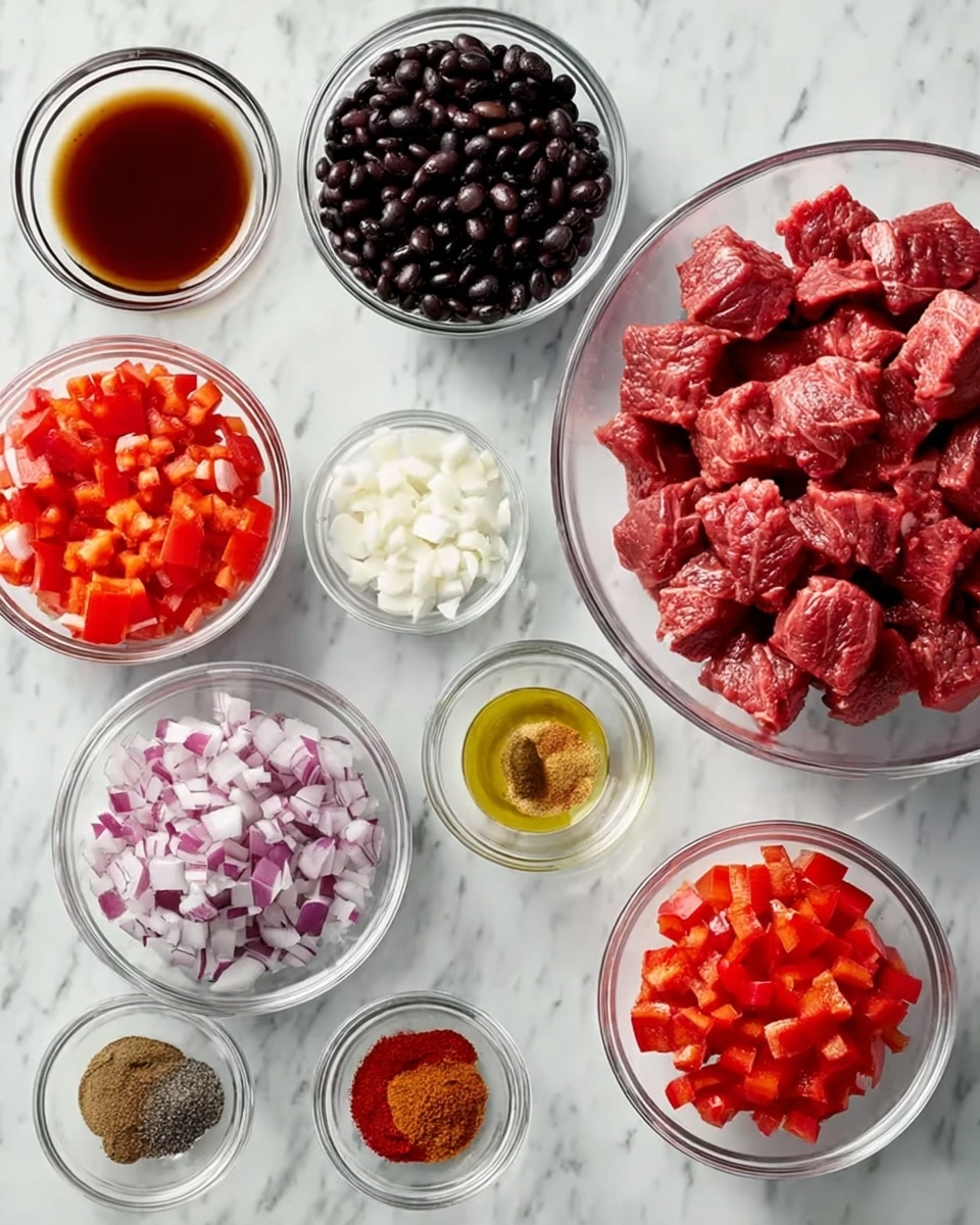 The image shows a white marbled surface with glass bowls arranged neatly, each containing different ingredients for a recipe. There is a large bowl in the center filled with raw, cubed red meat. Around it, smaller bowls hold chopped red onions, black beans, diced red tomatoes, chopped red bell peppers, minced garlic, olive oil, and various powders including white, brown, and red spices. A small glass cup contains a dark reddish-brown liquid. The bowls are clear and round, allowing the vibrant colors and textures of the ingredients to be seen clearly. photo taken with an iphone --ar 4:5 --v 7