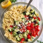 Bow Tie Pasta Salad with Cherry Tomatoes, Bocconcini, Spinach, and Pesto Recipe