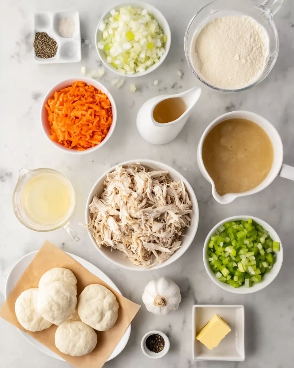 A top-down view of multiple small white bowls and dishes arranged on a white marbled surface showing ingredients for cooking. In the center, there is a white bowl filled with shredded cooked chicken that is light brown and textured. Surrounding it, from top left going clockwise, is a bowl of shredded orange carrots, a bowl of diced white onions, a bowl of creamy yellow mustard, a small white bowl with white flour, a small white square dish with black pepper, a white cup filled with light brown broth, a clear measuring cup with a frothy beige liquid, a white bowl filled with chopped green celery, a whole garlic bulb, a small white dish with a pat of yellow butter, and an oval white plate lined with brown paper holding four small white round dough pieces or biscuits. Photo taken with an iphone --ar 4:5 --v 7