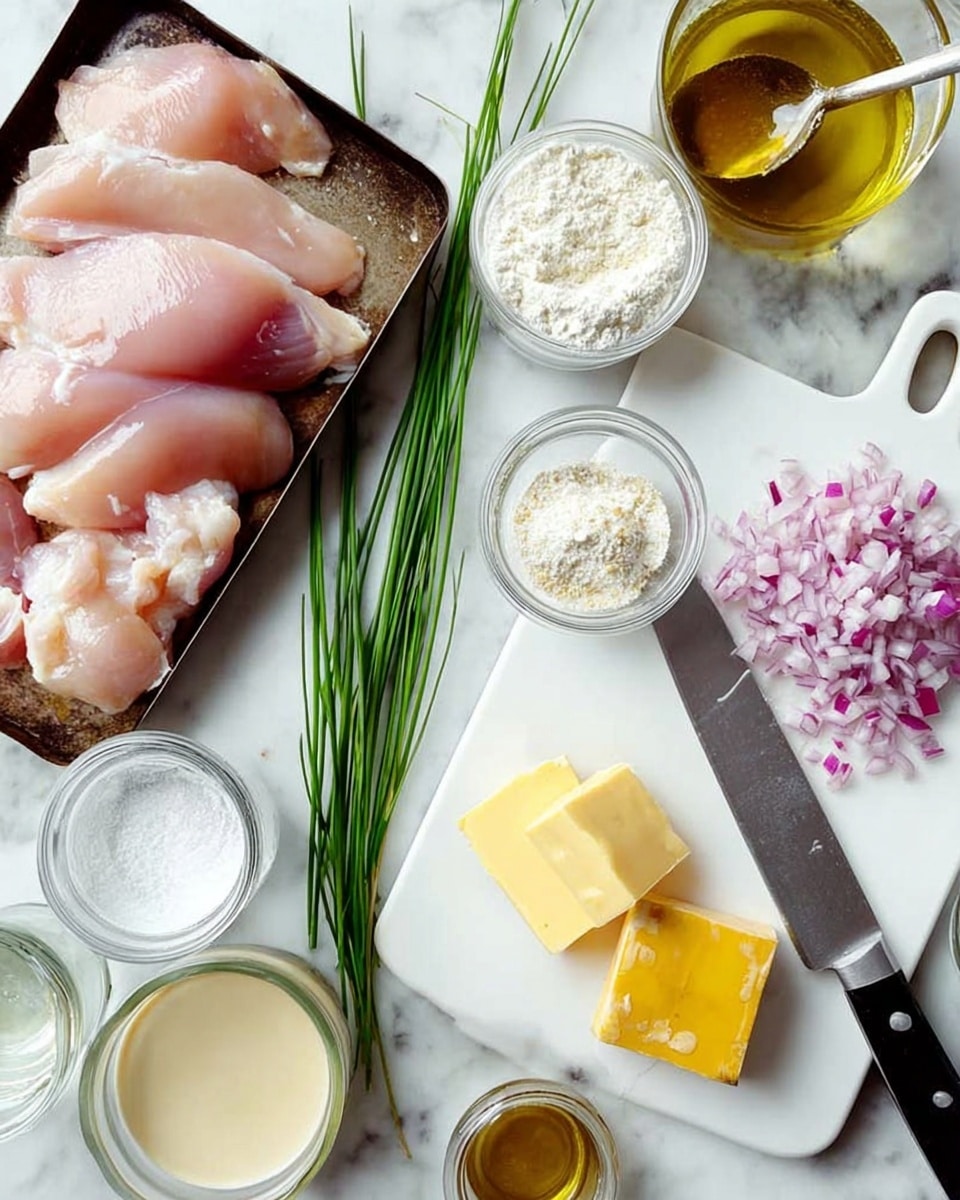 The image shows a white marbled surface with a clear arrangement of ingredients for cooking. There is a black tray on the left side filled with raw, light pink chicken fillets. Below the tray, a metal measuring cup filled with white flour is placed. Next to the tray is a large knife with a black handle lying on a white cutting board. On the cutting board, there are thin slices of light purple onion and finely chopped small pieces of onion. To the right of the onions are two thick slices of yellow butter. Surrounding the cutting board are small bowls filled with ingredients including mayonnaise, a light golden liquid in a glass container, white granulated salt in a small brown bowl, a light yellow oil in a white bowl, and a brown jar with a spoon inside. Several long green chives are lying diagonally across the bottom right corner of the cutting board. The photo captures the freshness and neat layout of the ingredients on the white marbled surface, photo taken with an iphone --ar 4:5 --v 7