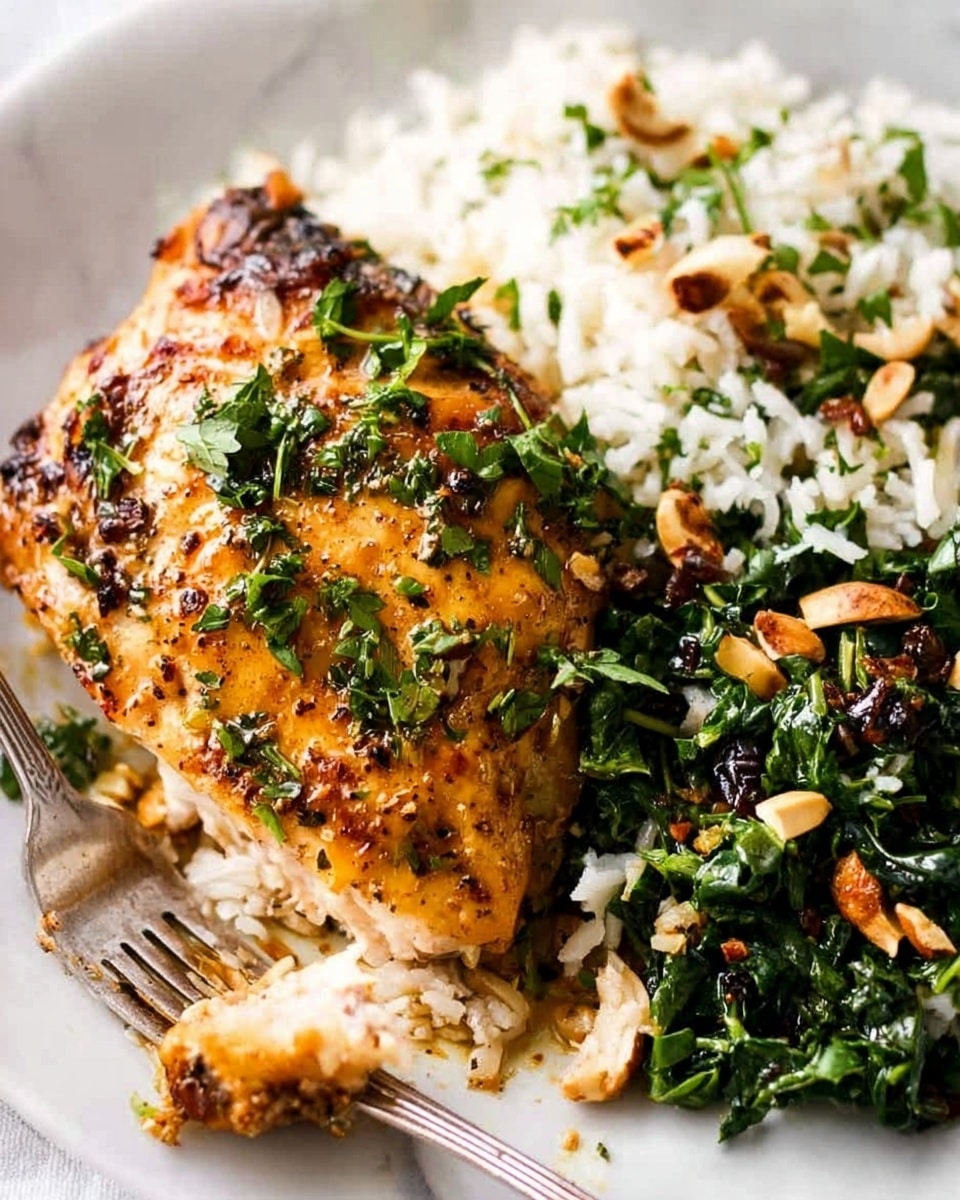 The image shows a close-up of a white plate on a white marbled surface with a cooked golden-brown chicken piece on the left side, topped with green herbs. To the right of the chicken is a pile of white rice mixed with dark green leafy vegetables and sprinkled with chopped nuts. A fork is partially cutting a piece of the chicken at the bottom left corner. Photo taken with an iphone --ar 4:5 --v 7