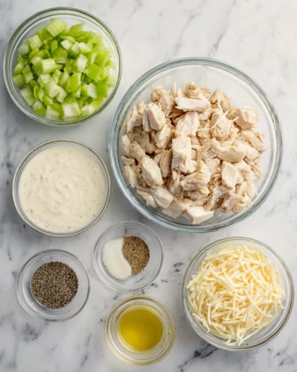 The image shows six clear glass bowls placed on a white marbled surface. The largest bowl in the center holds chopped cooked chicken pieces that are light brown and white. Surrounding it are five smaller bowls: one with chopped green celery, one with a creamy white thick sauce, one with thin shredded pale yellow cheese, one with a small amount of yellow liquid, and the last with black pepper. The arrangement is neat and evenly spaced. Photo taken with an iphone --ar 4:5 --v 7