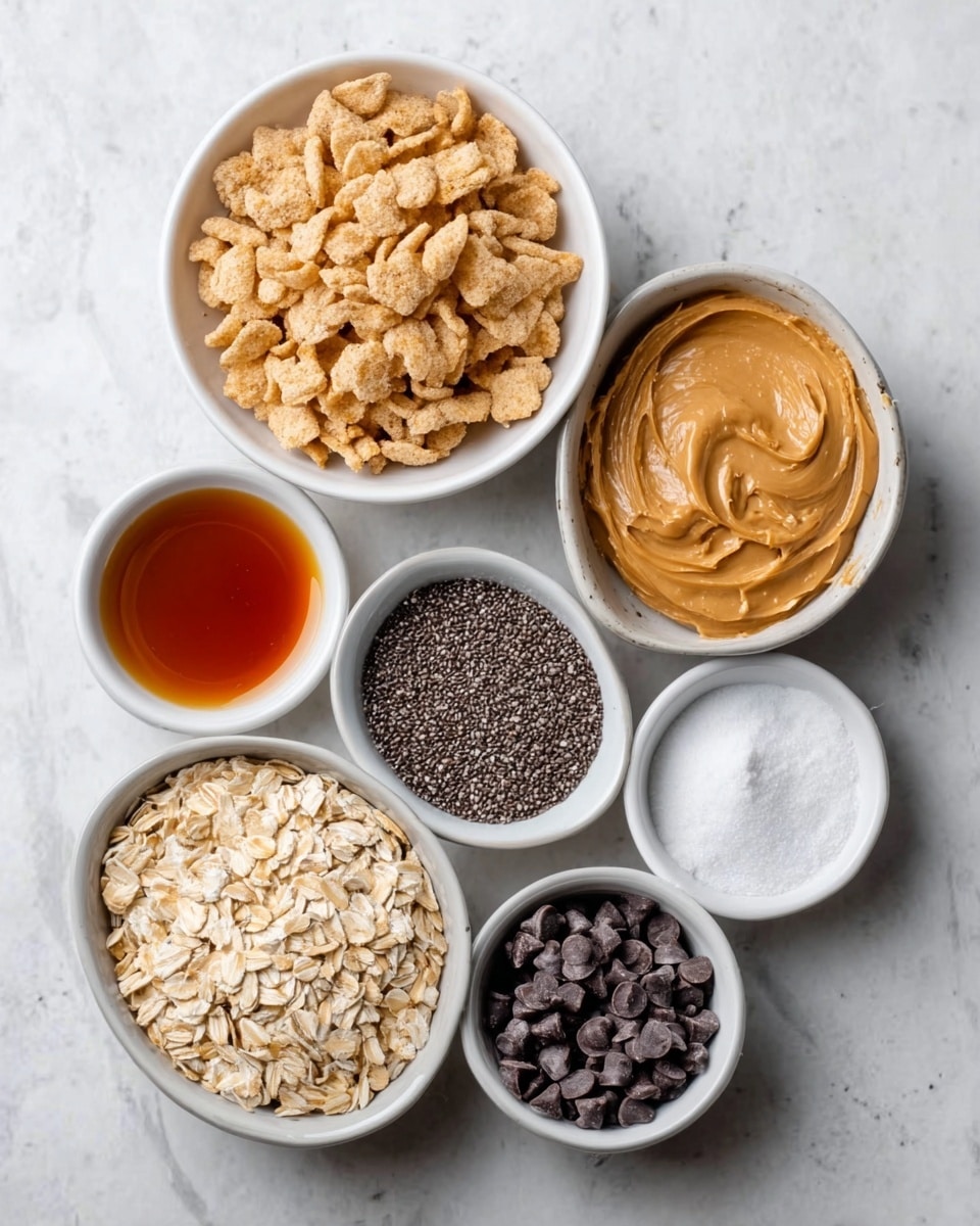 The image shows seven white bowls on a white marbled surface, each filled with different ingredients. The largest bowl at the top left contains light brown puffed cereal pieces. To the right of it, another large bowl holds creamy light brown peanut butter with a smooth texture. Below, five smaller bowls are arranged in a slightly curved row: the first bowl on the left has a dark amber liquid, likely syrup; next to it is a bowl with creamy light brown rolled oats; the middle bowl contains small black chia seeds; the next one has dark brown chocolate chips; and the last bowl on the right has a fine white powder, probably salt. The bowls have clean edges and are neatly placed to form a balanced composition. Photo taken with an iphone --ar 4:5 --v 7