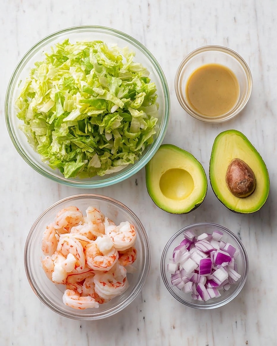 The image shows six ingredients placed on a white marbled surface. On the left, there is a clear bowl filled with finely chopped light green lettuce. To the right of the bowl, there are two halves of an avocado; one half has the brown seed inside and the other half is empty, showing its creamy light green inside. Below the avocado halves, there is a small clear bowl with peeled shrimp that are light pink with red stripes. Next to the shrimp, another small clear bowl holds chopped purple and white onion pieces. Above these bowls, there is a small clear container filled with light brown dressing or sauce. The arrangement is neat and well lit. photo taken with an iphone --ar 4:5 --v 7