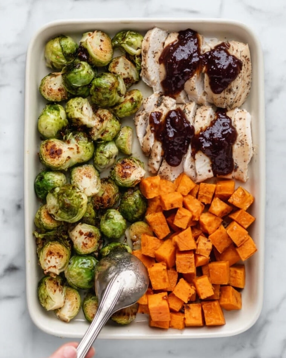 The image shows a white tray with three sections of food. On the left, there are roasted Brussels sprouts, golden brown with a slightly crispy texture. In the middle, there are several pieces of cooked turkey topped with dark brown sauce. On the right, there are many small cubes of orange sweet potato, cooked but firm. The tray sits on a white marbled surface, and a woman’s hand is holding a silver serving spoon in the roasted Brussels sprouts section. photo taken with an iphone --ar 4:5 --v 7