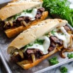 Herb Butter Steak Sandwich with Caramelized Onions and Melted Havarti Recipe